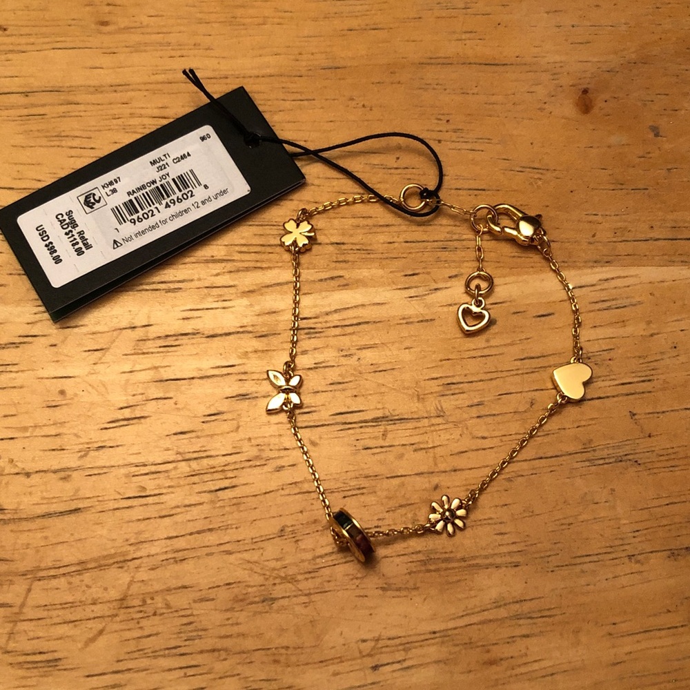 Kate Spade Gold Tone Rainbow Joy Charm Bracelet Heart, Flower, Clover NWT